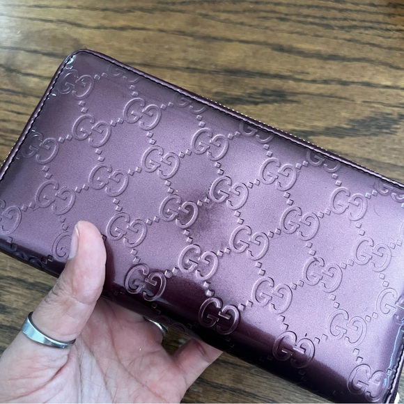 ***NOT FOR SALE!!
Gucci Metallic Purple GG Patent Leather Heart Zippy Wallet - Picture 8 of 16